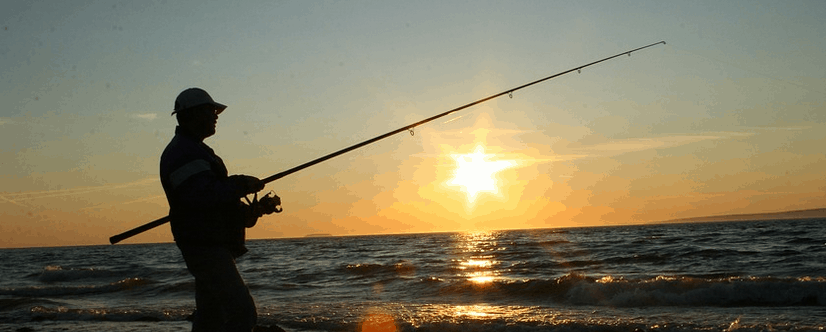 A man fishing without a Jon Boat.