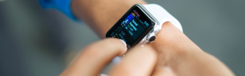 A woman with a smart watch from financing.