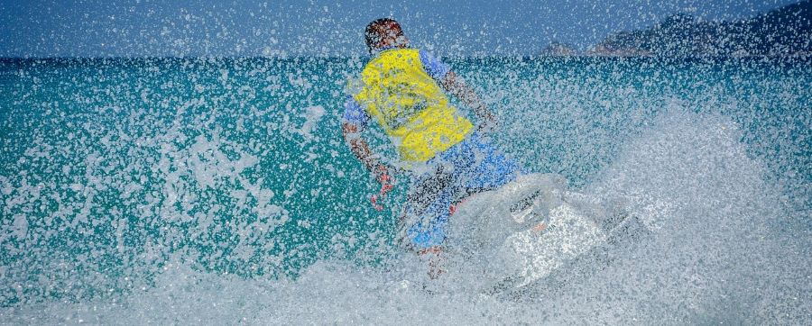 A man riding a Sea Doo after bad credit financing.