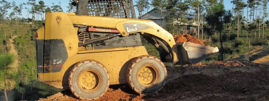 A skid steer purchased with financing.