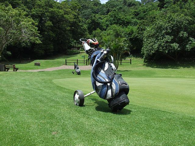 Golf clubs being used.