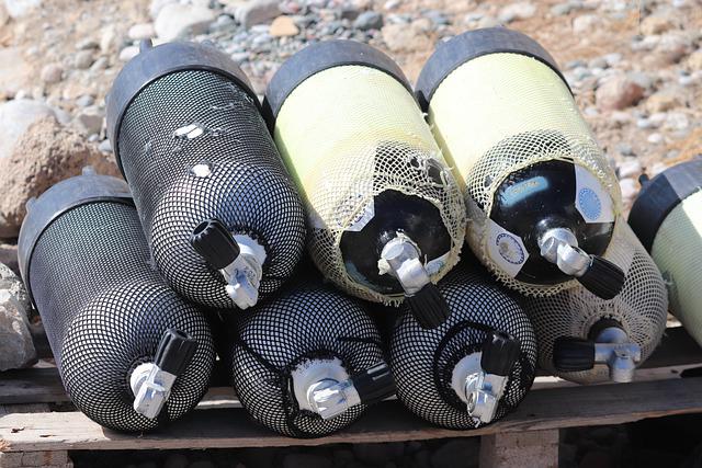 Scuba tanks on a dock.
