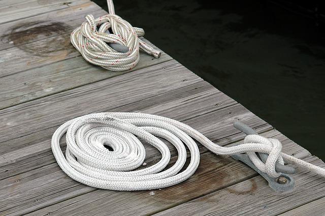 Boat tied to a dock.