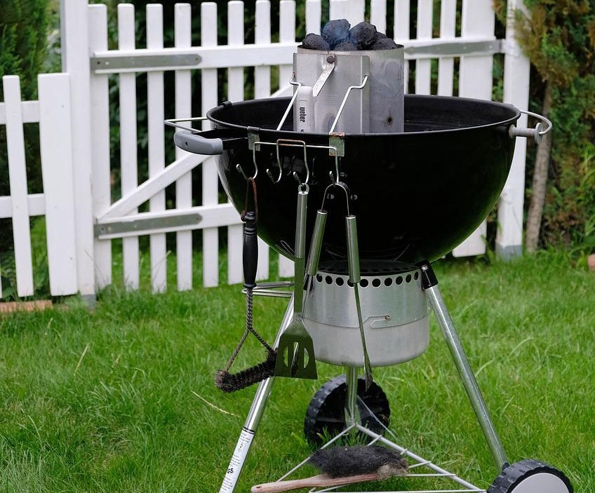 A weber grill in use.