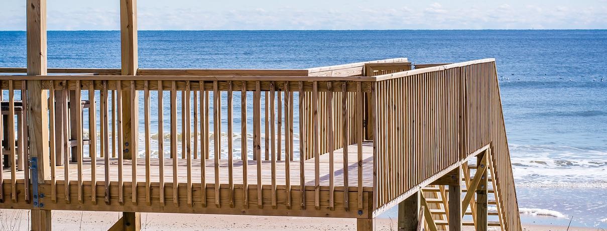 A wood deck on the ocean.