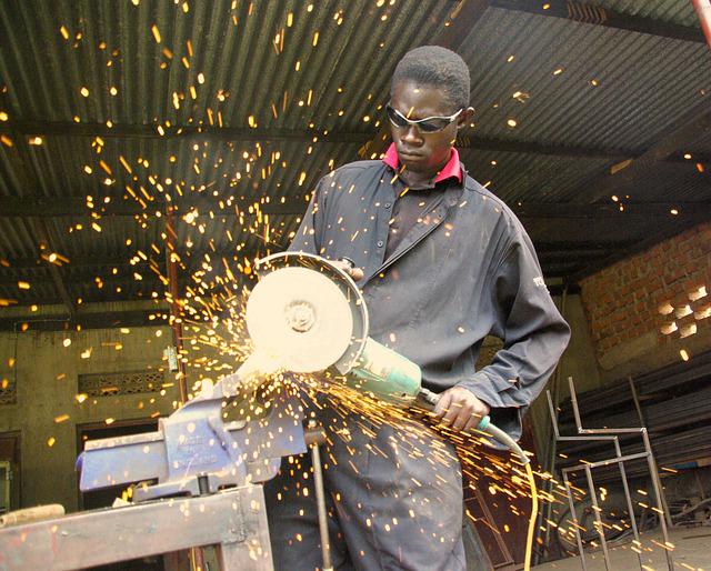 Man using equipment from a bad credit financing offer.